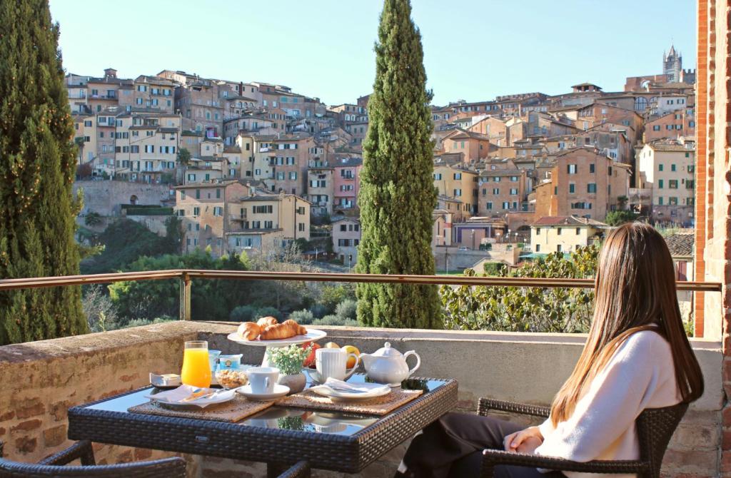 A balcony or terrace at Villa del Sole Siena