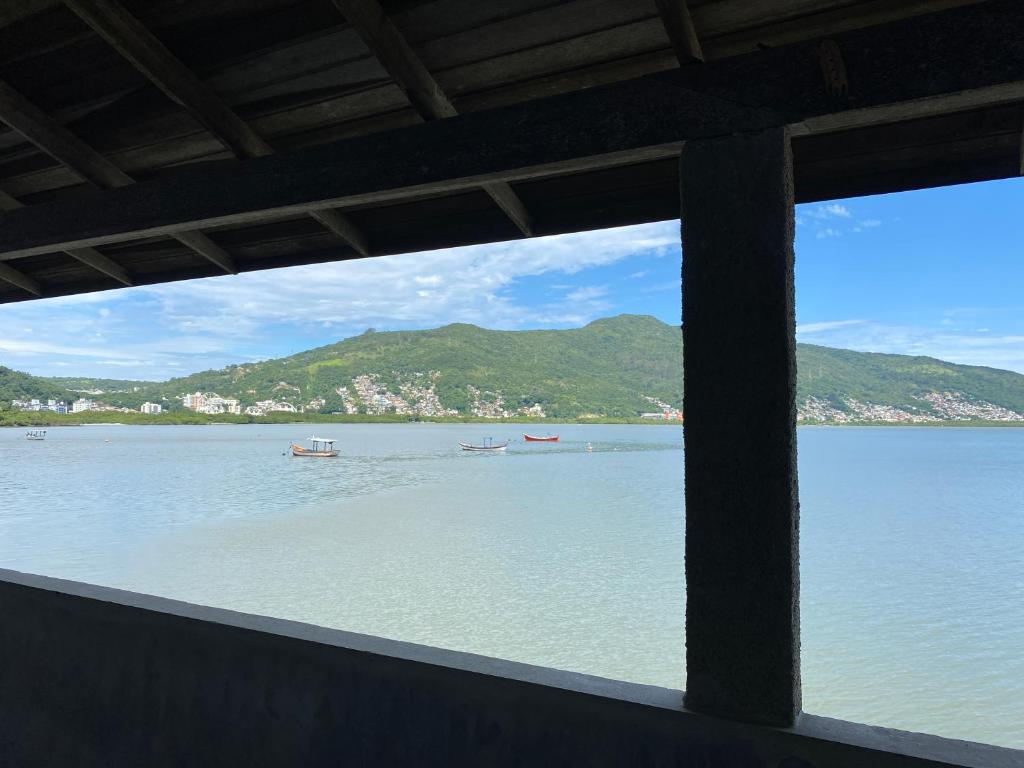 a view of a large body of water with boats in it at Hostel Baía Sul Apenas para Mulheres in Florianópolis