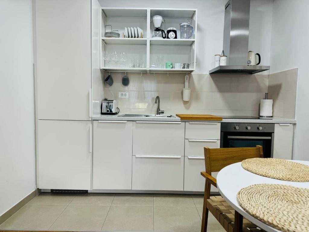 Kuchyňa alebo kuchynka v ubytovaní Apartment Allora