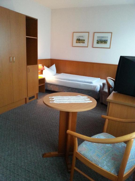 Postel nebo postele na pokoji v ubytování Hotel Park Eden