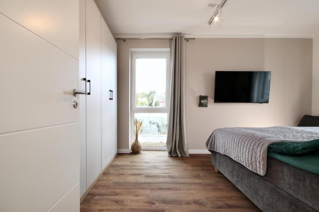 Voodi või voodid majutusasutuse Grömitz - ELSAS KOJE toas