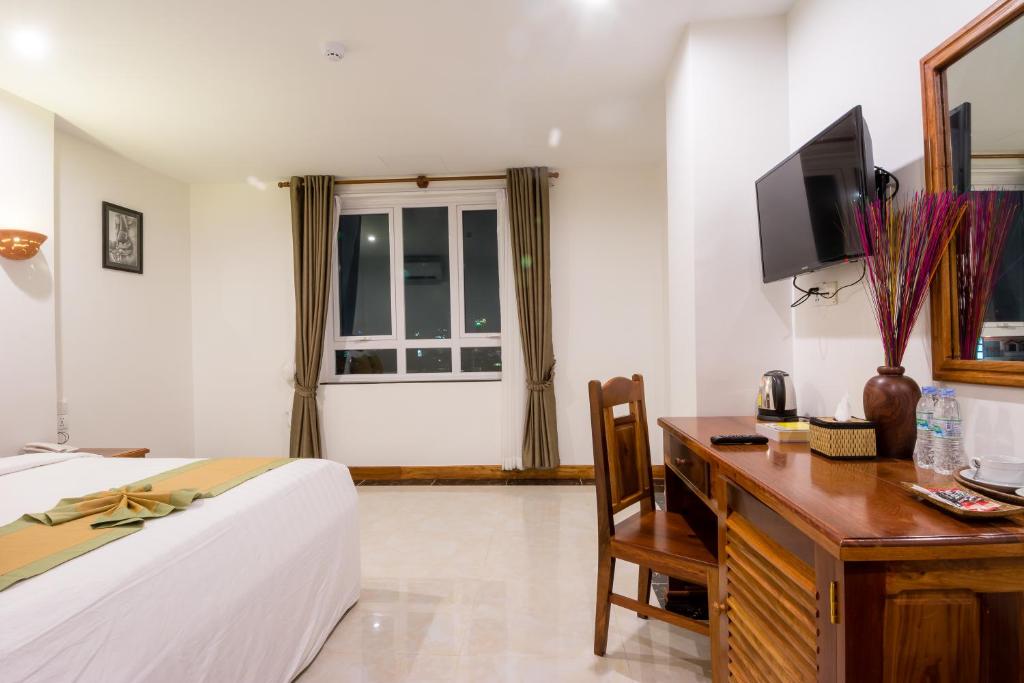 TV a/nebo společenská místnost v ubytování Relax Hotel
