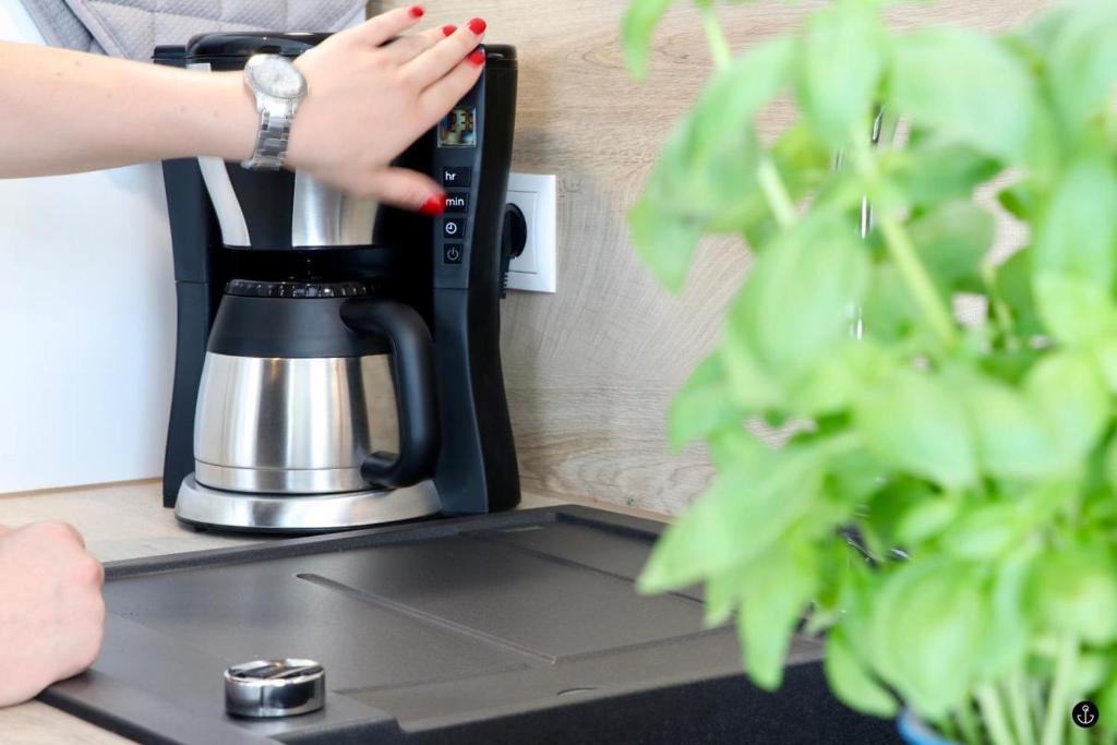Příslušenství pro přípravu čaje a kávy v ubytování Sonnengarten 4 - Sonnenveranda