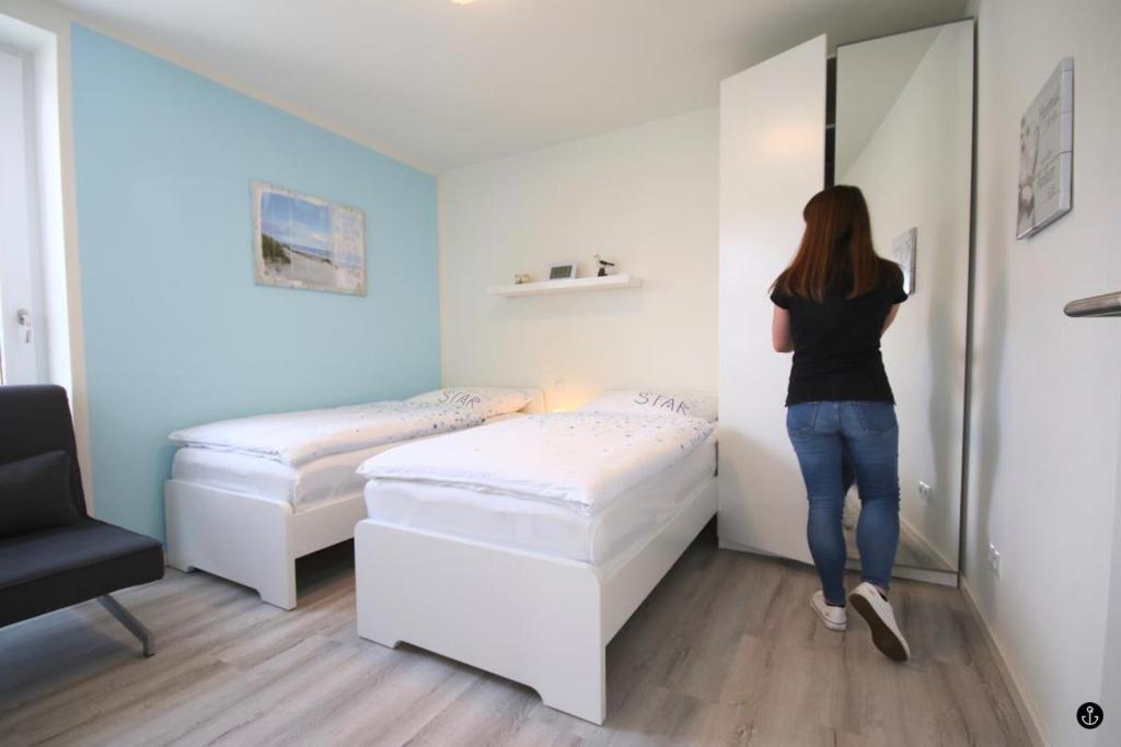 Postel nebo postele na pokoji v ubytování Sonnengarten 4 - Sonnenveranda