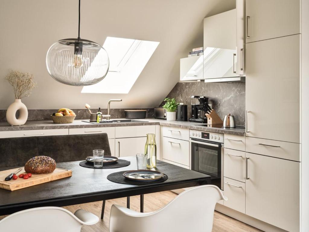 Kuchyň nebo kuchyňský kout v ubytování LUCIES PLACE Kellenhusen