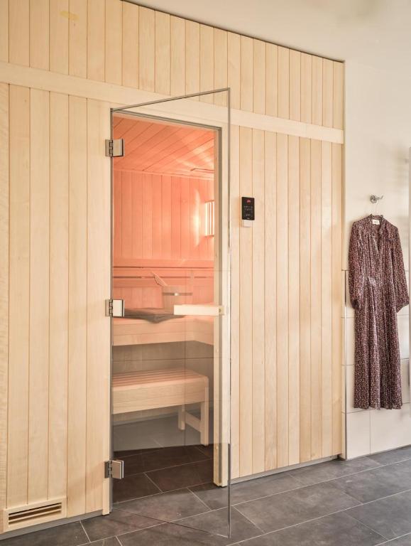 Postel nebo postele na pokoji v ubytování LUCIES PLACE Kellenhusen