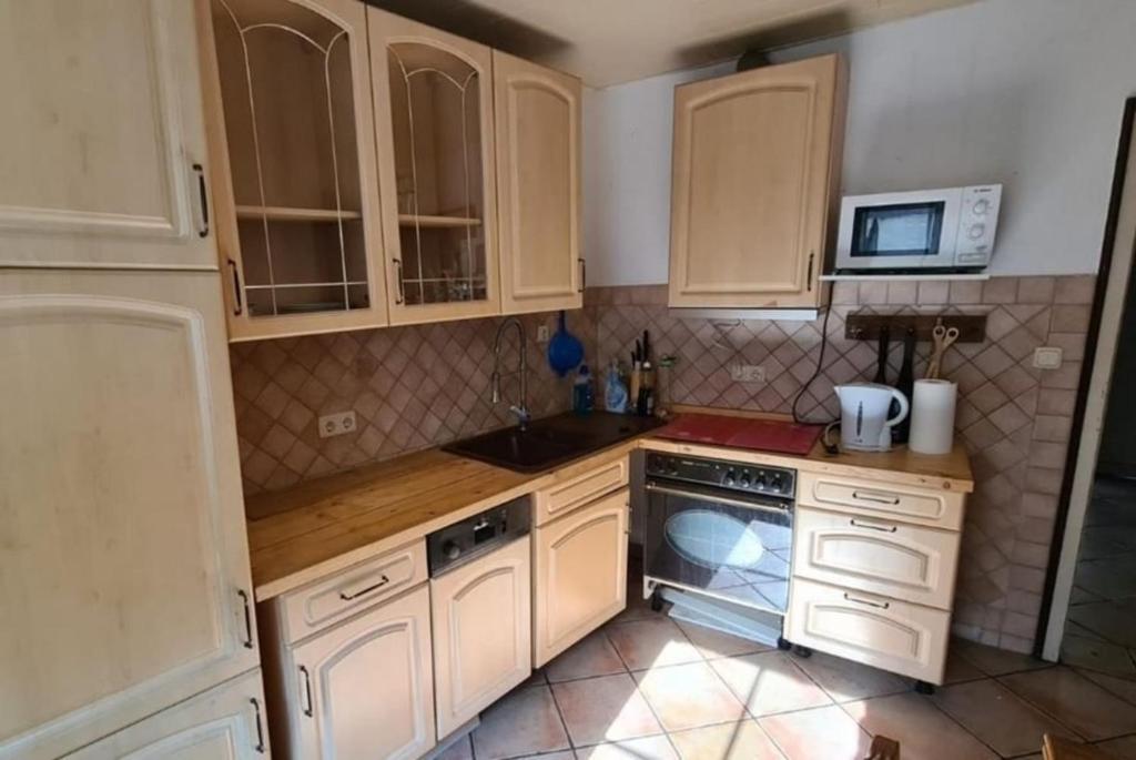 Kuchyň nebo kuchyňský kout v ubytování Haus Nummer 7