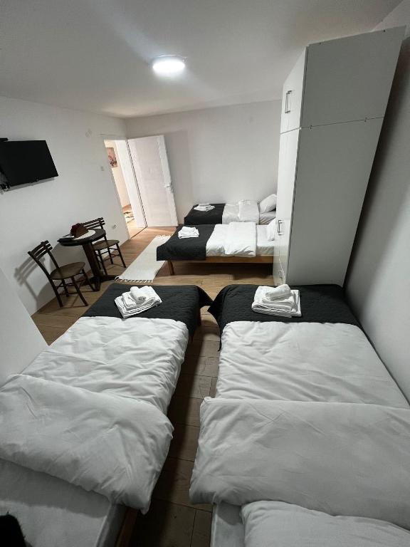 Postel nebo postele na pokoji v ubytování Konaciste Napredak