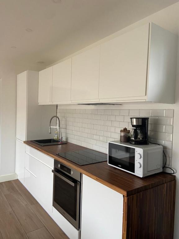 Kuchyň nebo kuchyňský kout v ubytování Maison au calme