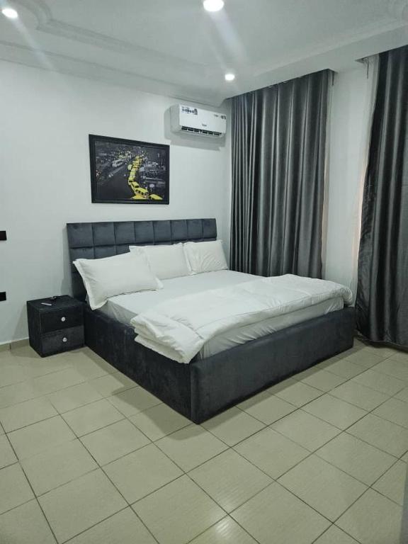 Postel nebo postele na pokoji v ubytování Molarans Place