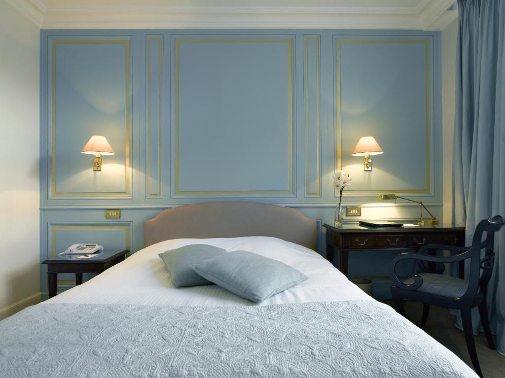 Postel nebo postele na pokoji v ubytování Hotel Damier Kortrijk
