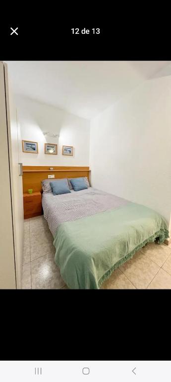 Postel nebo postele na pokoji v ubytování Apartamento junto al mar
