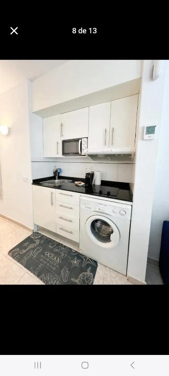 Kuchyň nebo kuchyňský kout v ubytování Apartamento junto al mar