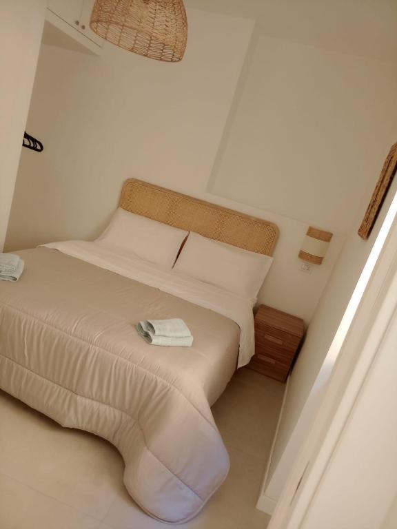 Postel nebo postele na pokoji v ubytování Terrazza Maranola