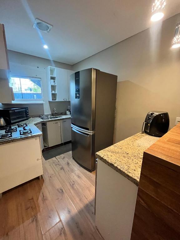 Kuchyň nebo kuchyňský kout v ubytování Hotel Lorimar