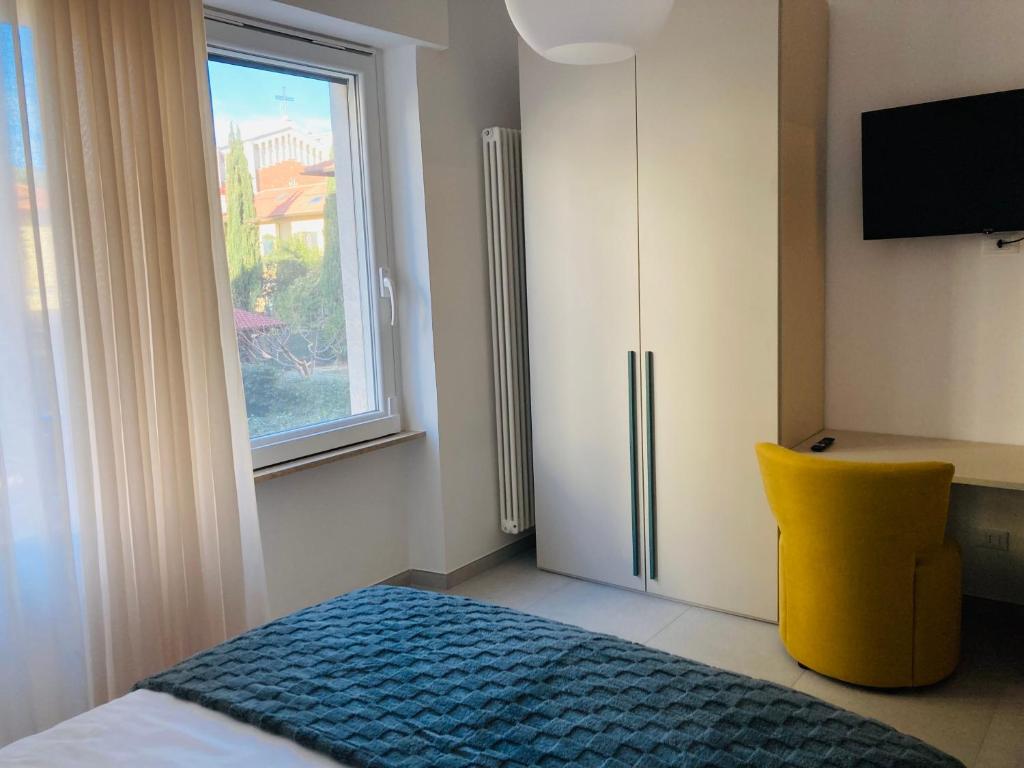 Postel nebo postele na pokoji v ubytování Frangente Home