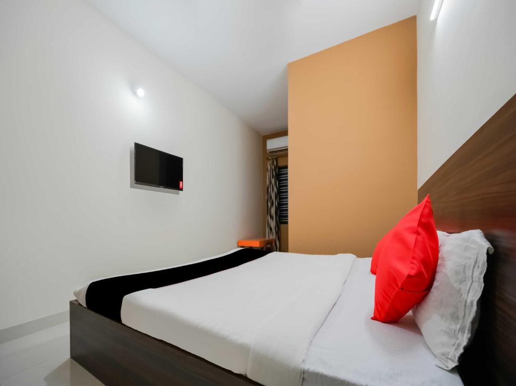 Postel nebo postele na pokoji v ubytování Super Namaskar Diamond Key