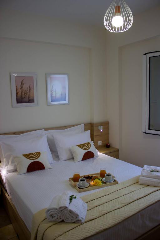Postel nebo postele na pokoji v ubytování Maistro Suites With Pool, Matala