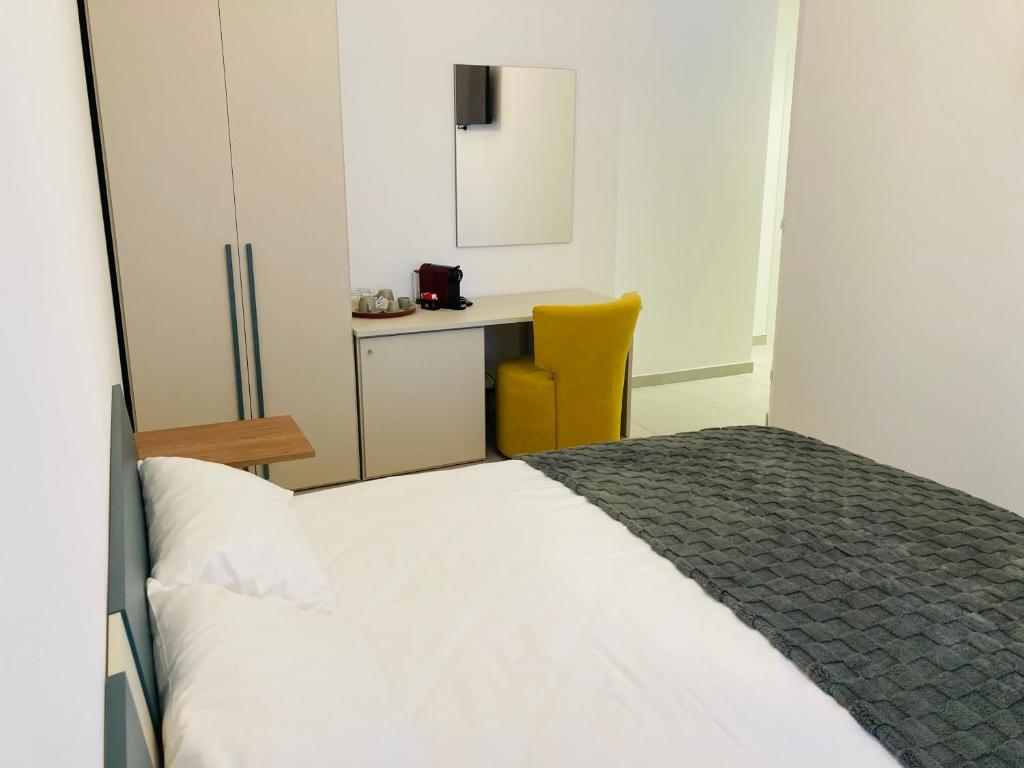 Postel nebo postele na pokoji v ubytování Frangente Home