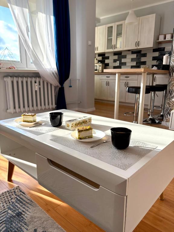 Kuchyňa alebo kuchynka v ubytovaní Apartament z widokiem na Spodek