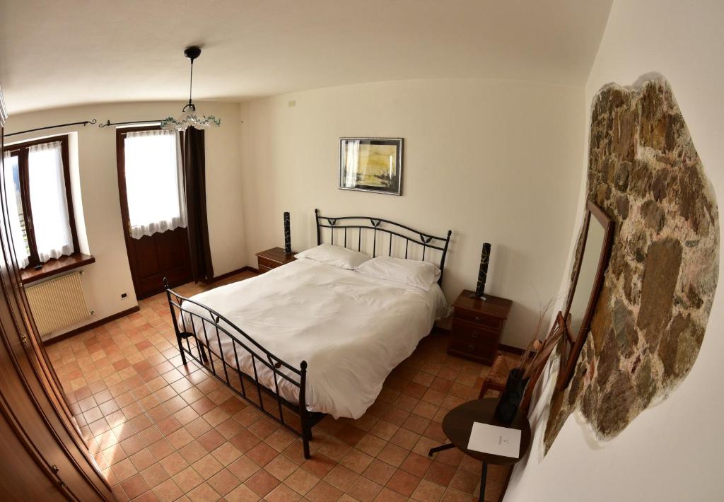 Postel nebo postele na pokoji v ubytování Tenuta Valdomini