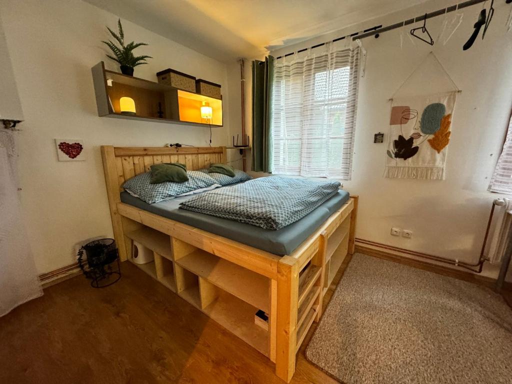 Łóżko lub łóżka w pokoju w obiekcie Apartmány Srub Jenišov