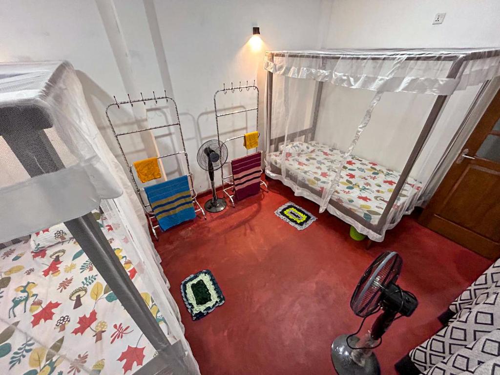 Postel nebo postele na pokoji v ubytování Sea Hub Resort Midigama