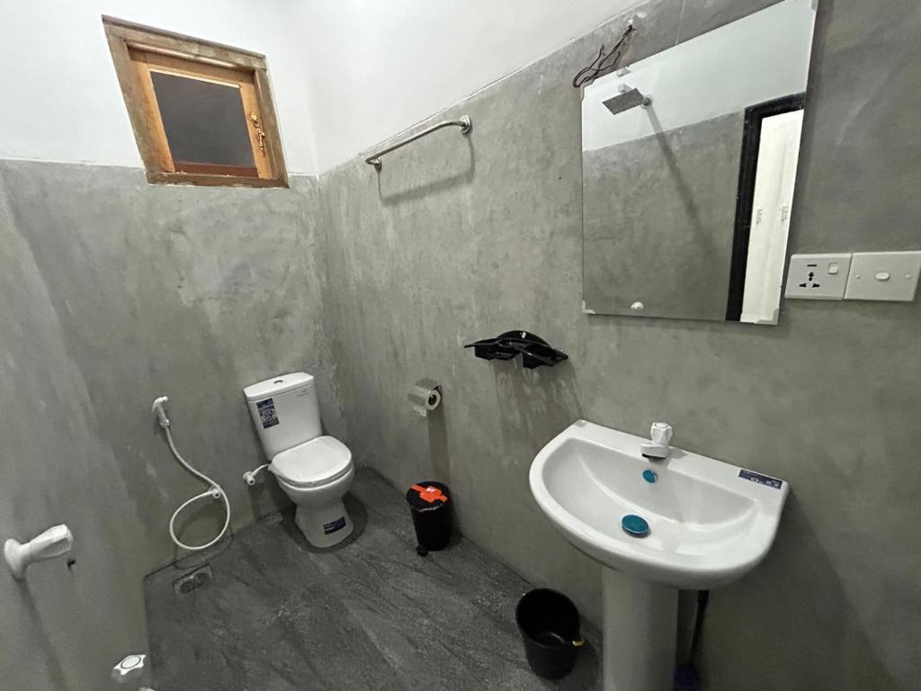 Koupelna v ubytování Sea Hub Resort Midigama