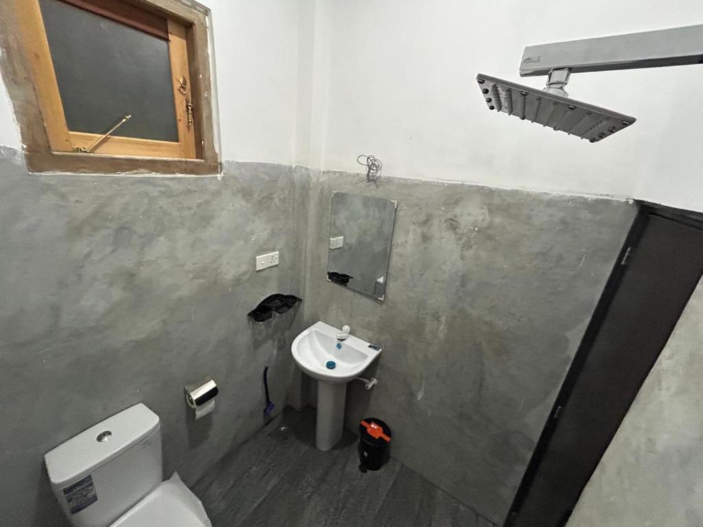 Koupelna v ubytování Sea Hub Resort Midigama