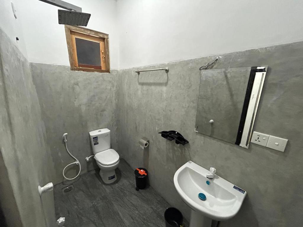 Koupelna v ubytování Sea Hub Resort Midigama