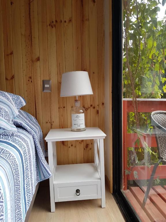 Postel nebo postele na pokoji v ubytování Cabaña Zapallar interior