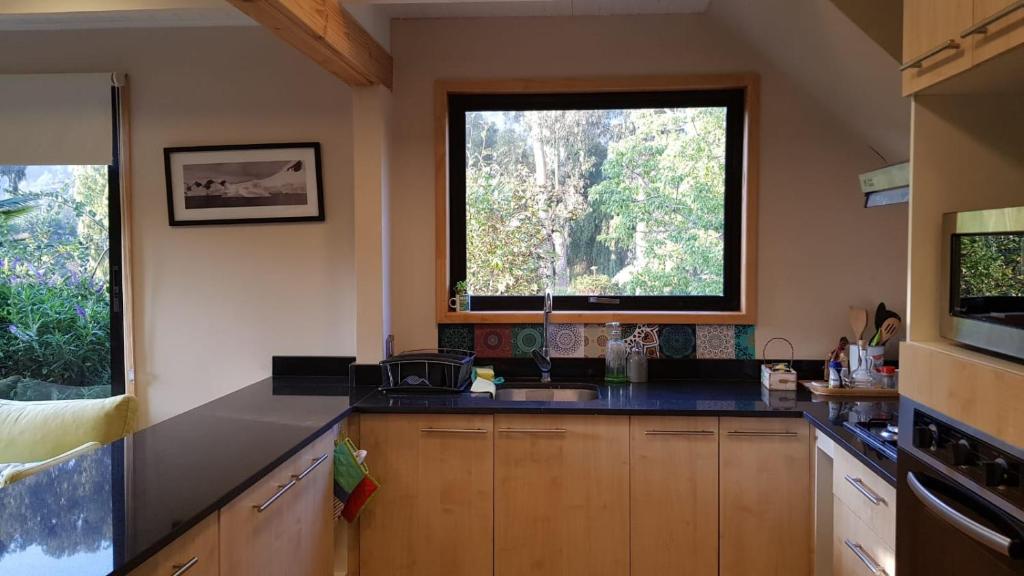Kuchyň nebo kuchyňský kout v ubytování Cabaña Zapallar interior