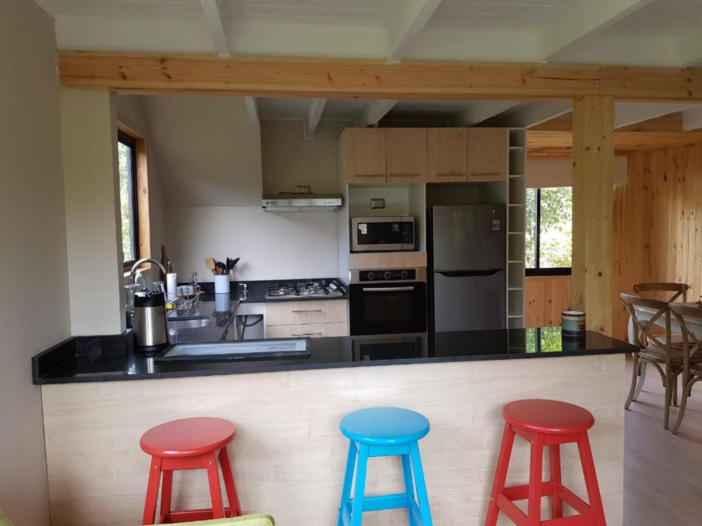 Kuchyň nebo kuchyňský kout v ubytování Cabaña Zapallar interior