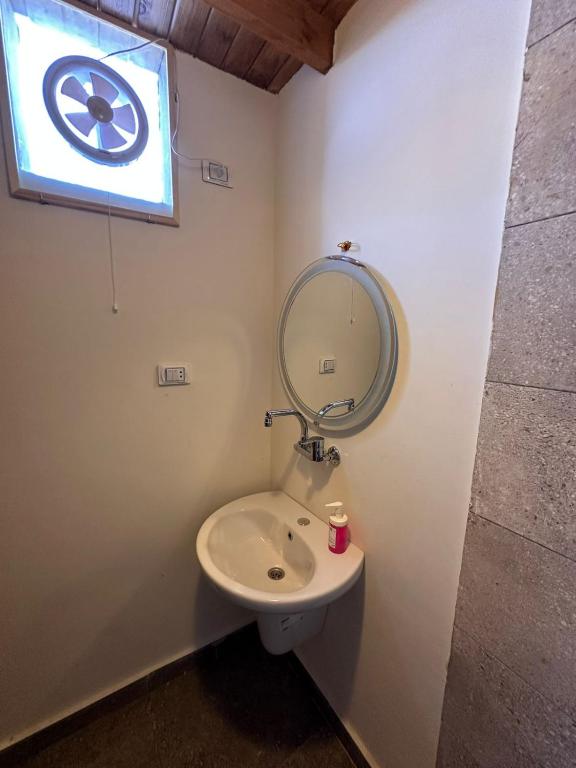 a bathroom with a sink and a mirror at trial camp in Dahab
