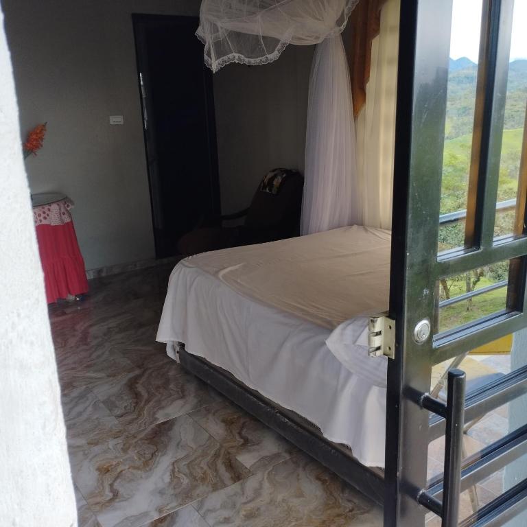 Postel nebo postele na pokoji v ubytování Mirador Alpe D, Huez1