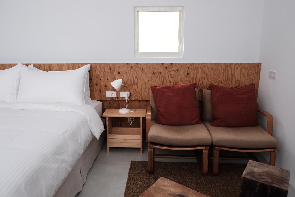 Postel nebo postele na pokoji v ubytování 洋Casa