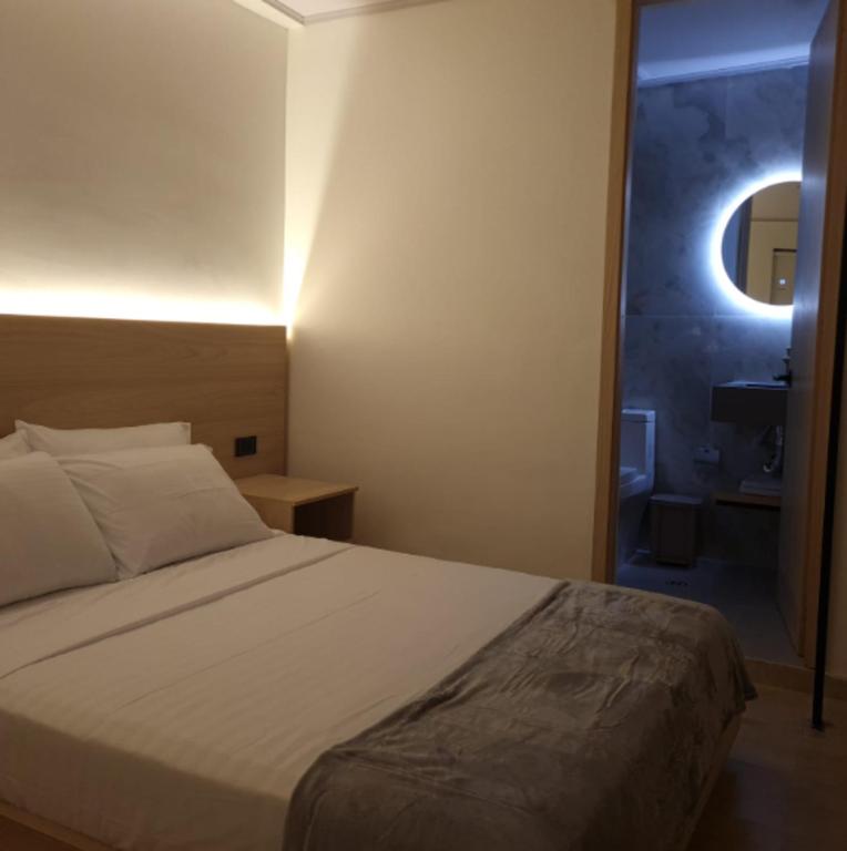 Cama ou camas em um quarto em Santa Julia Alojamiento