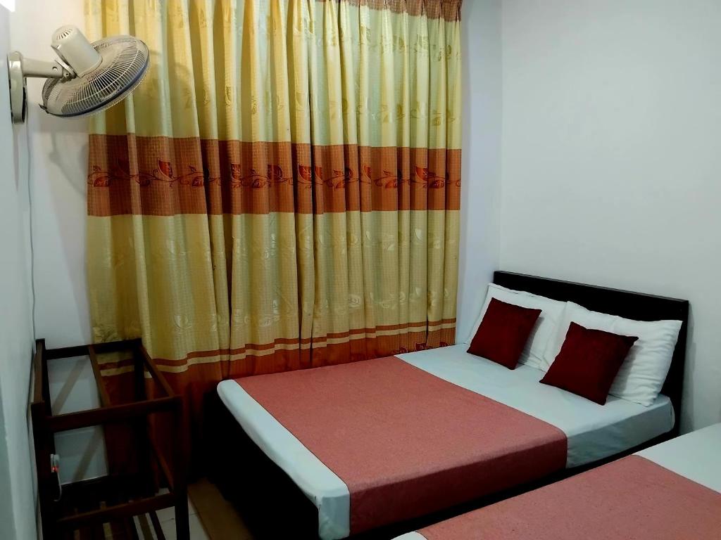 Postel nebo postele na pokoji v ubytování Paradise Residence Hanthana