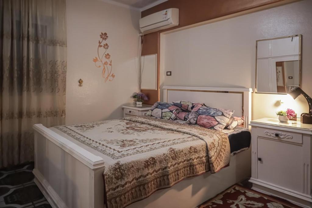 Postel nebo postele na pokoji v ubytování Star House City Stars