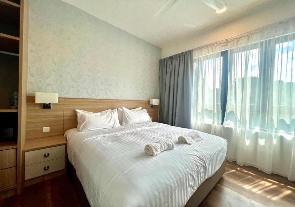 Postel nebo postele na pokoji v ubytování Hotspring 2 Room 1512 Suite Sunway Onsen with Theme Park View 4 pax