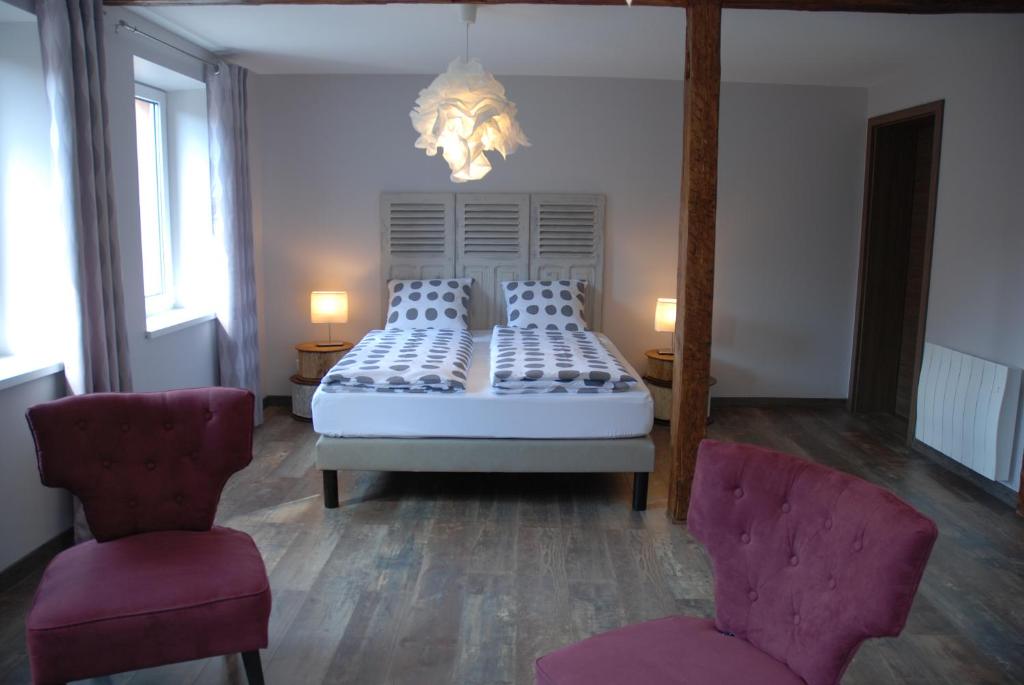 Ένα ή περισσότερα κρεβάτια σε δωμάτιο στο L’Été en Novembre