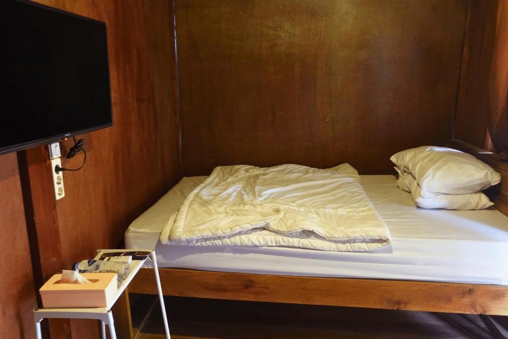 Postel nebo postele na pokoji v ubytování Mayeka Transit Hostel Bandara Internasional Lombok