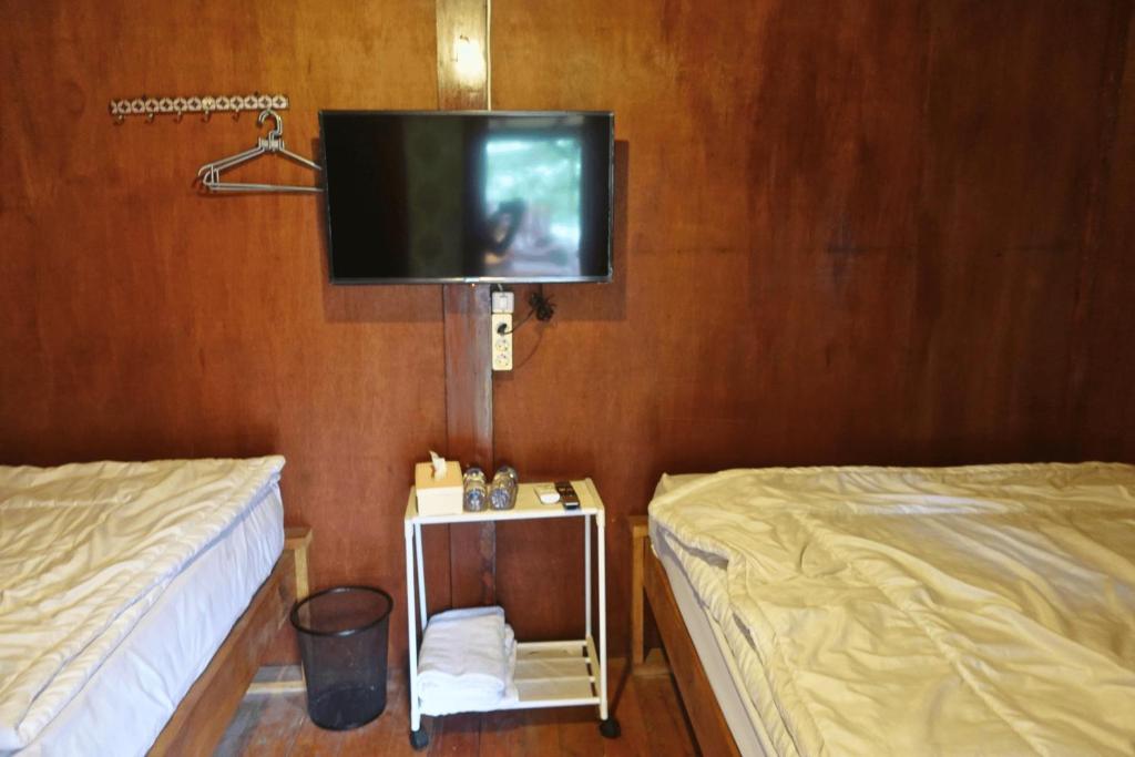 Postel nebo postele na pokoji v ubytování Mayeka Transit Hostel Bandara Internasional Lombok