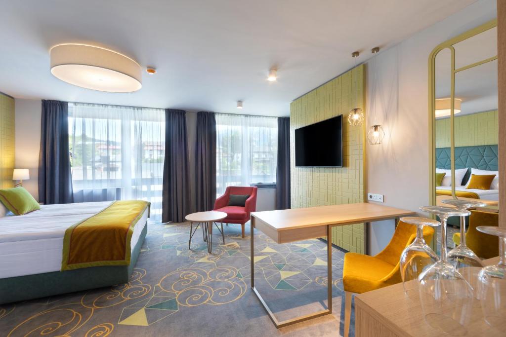 TV a/nebo společenská místnost v ubytování Bled Rose Hotel
