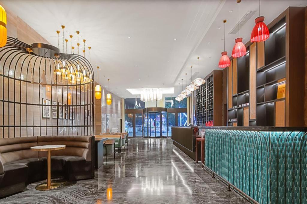 Posezení v ubytování Jinjiang Metropolo Shaoxing Keqiao Wanda Plaza