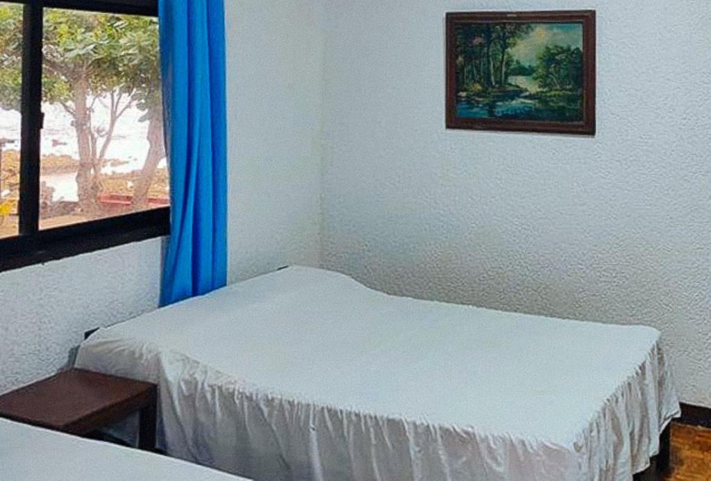 Postel nebo postele na pokoji v ubytování RedDoorz Hostel Hardin De Corales La Union