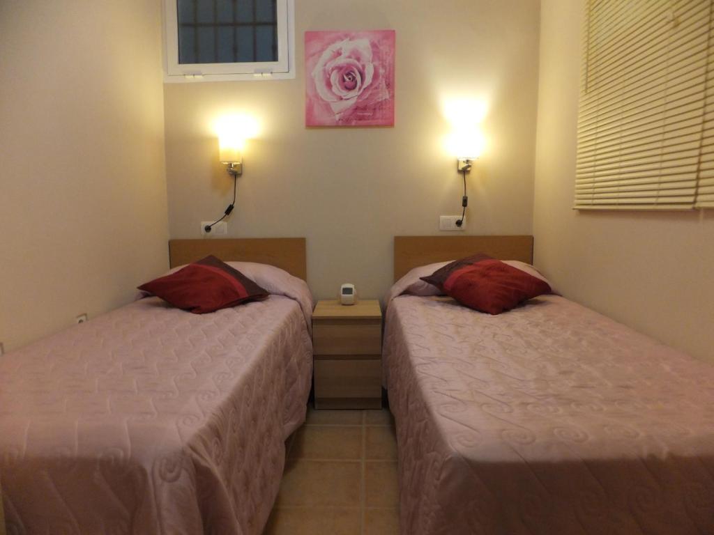 Posteľ alebo postele v izbe v ubytovaní Apartamento Bahia Dorada