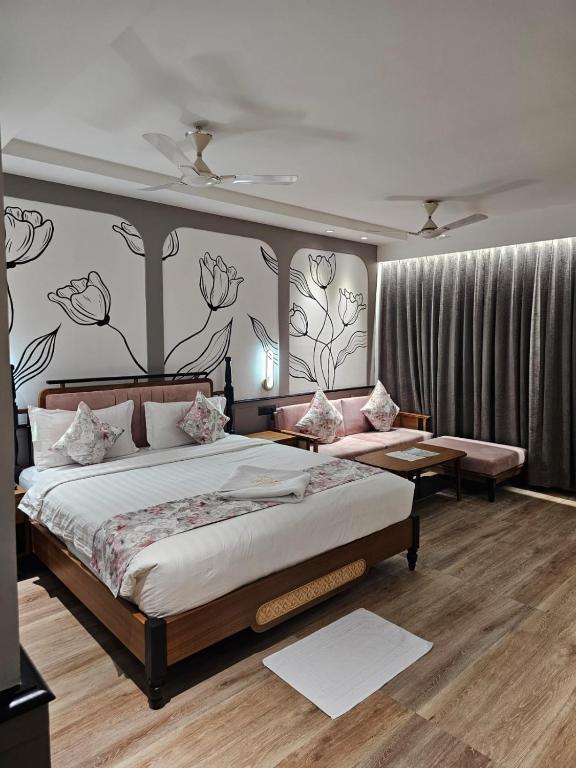 Postel nebo postele na pokoji v ubytování Hotel Sonar Bangla Kolaghat