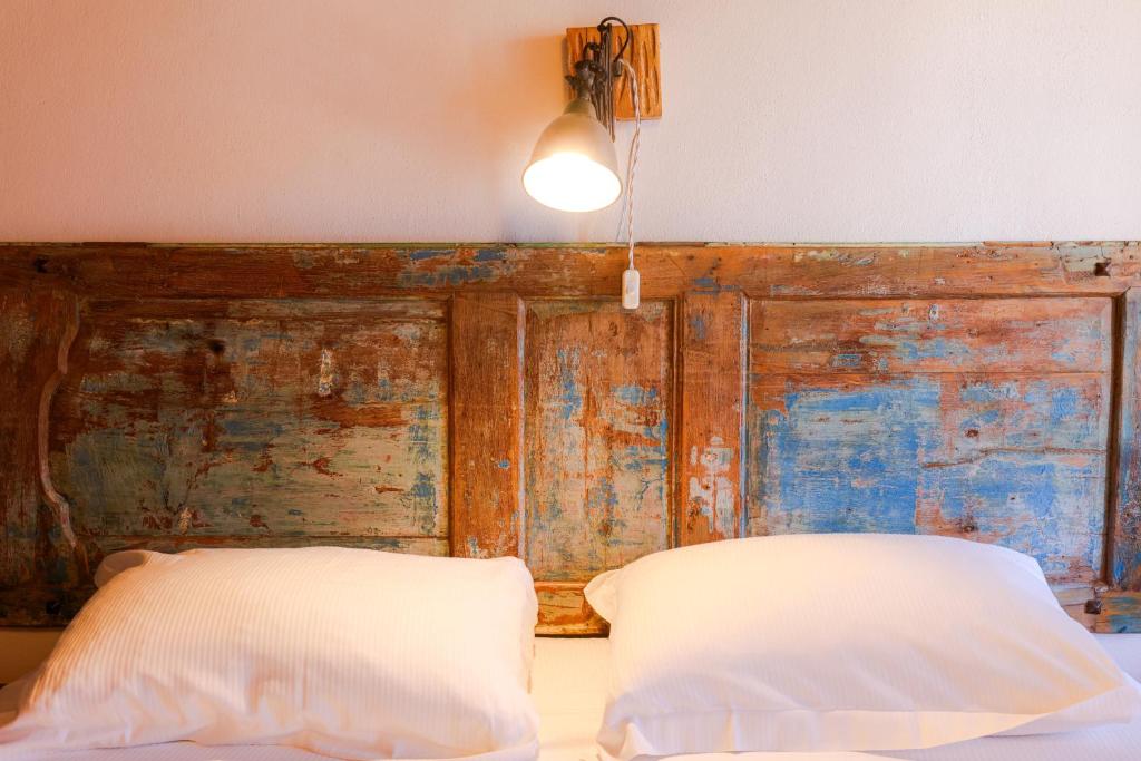 Posteľ alebo postele v izbe v ubytovaní B&B Luna & Stelle