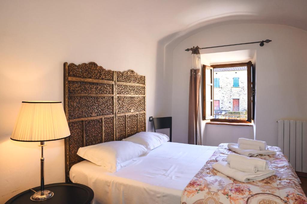 Posteľ alebo postele v izbe v ubytovaní B&B Luna & Stelle